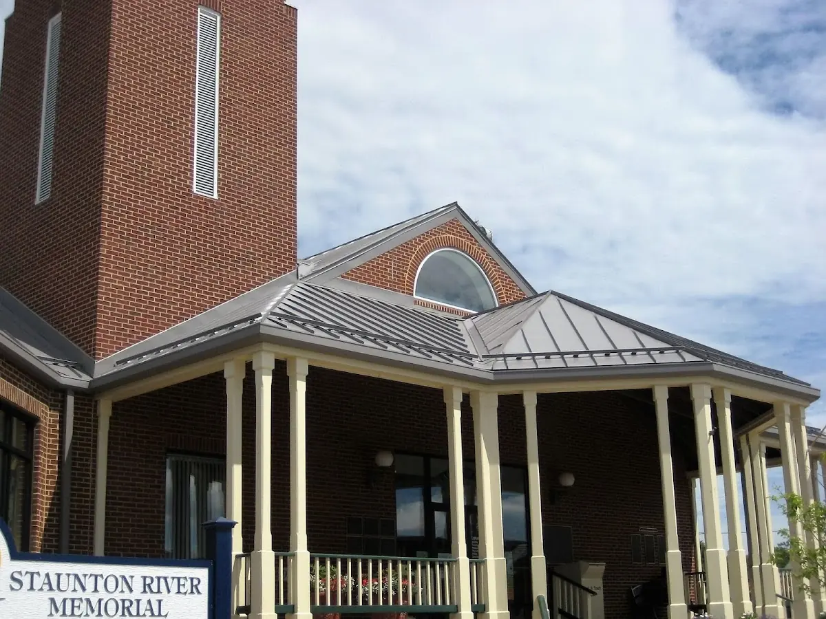 Skilled roofing craftsmen working on a residential roof in Wellington